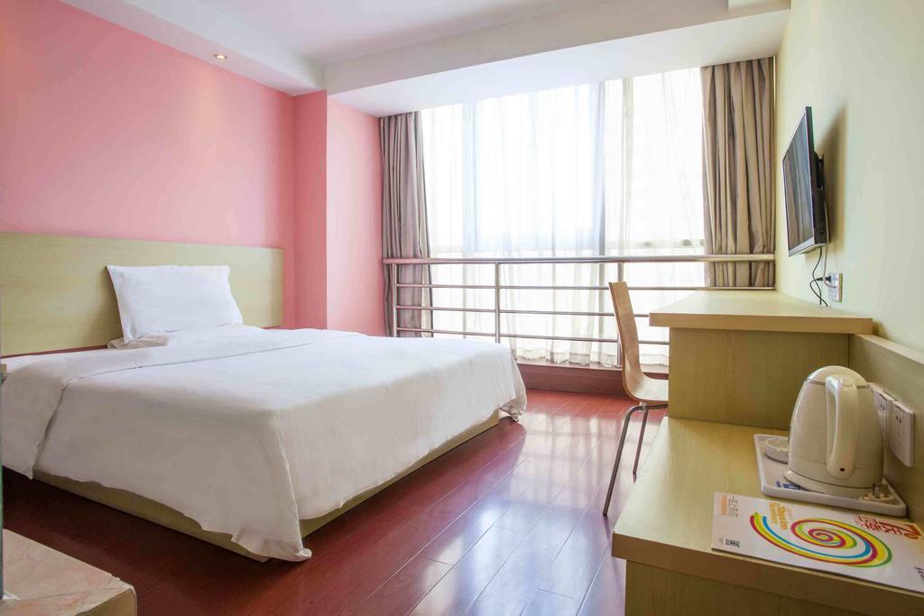 7Days Premium Zhanjiang Guomao Wangfujing Hotel Room photo